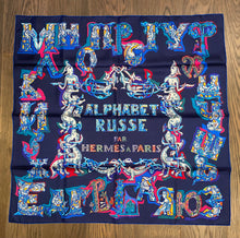 Load image into Gallery viewer, Hermes Silk Twill Scarf “Alphabet Russe" by Eugenia Miroshnichenko.