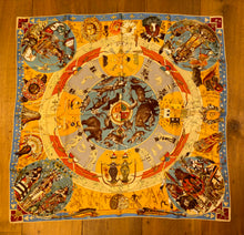 Load image into Gallery viewer, Hermes Silk Twill Scarf “Les Mythologies des Hommes Rouges” by Kermit Oliver.